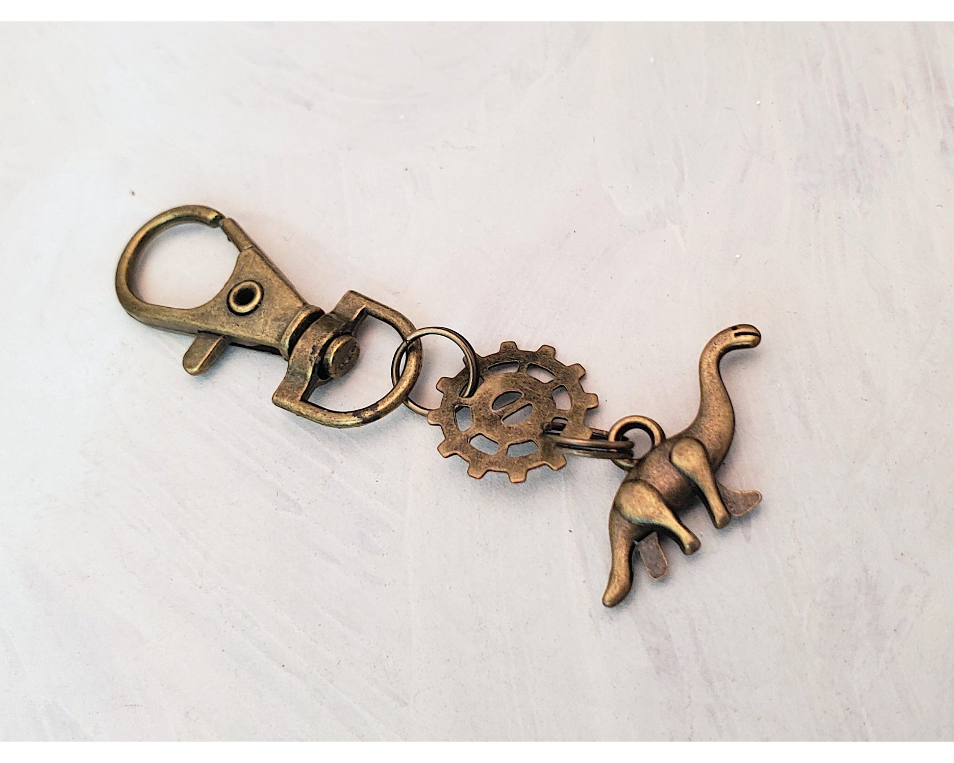 Steampunk Clip or Purse Charm with Fob in Antique Bronze, Gear, Dinosaur, Cellphone Charm