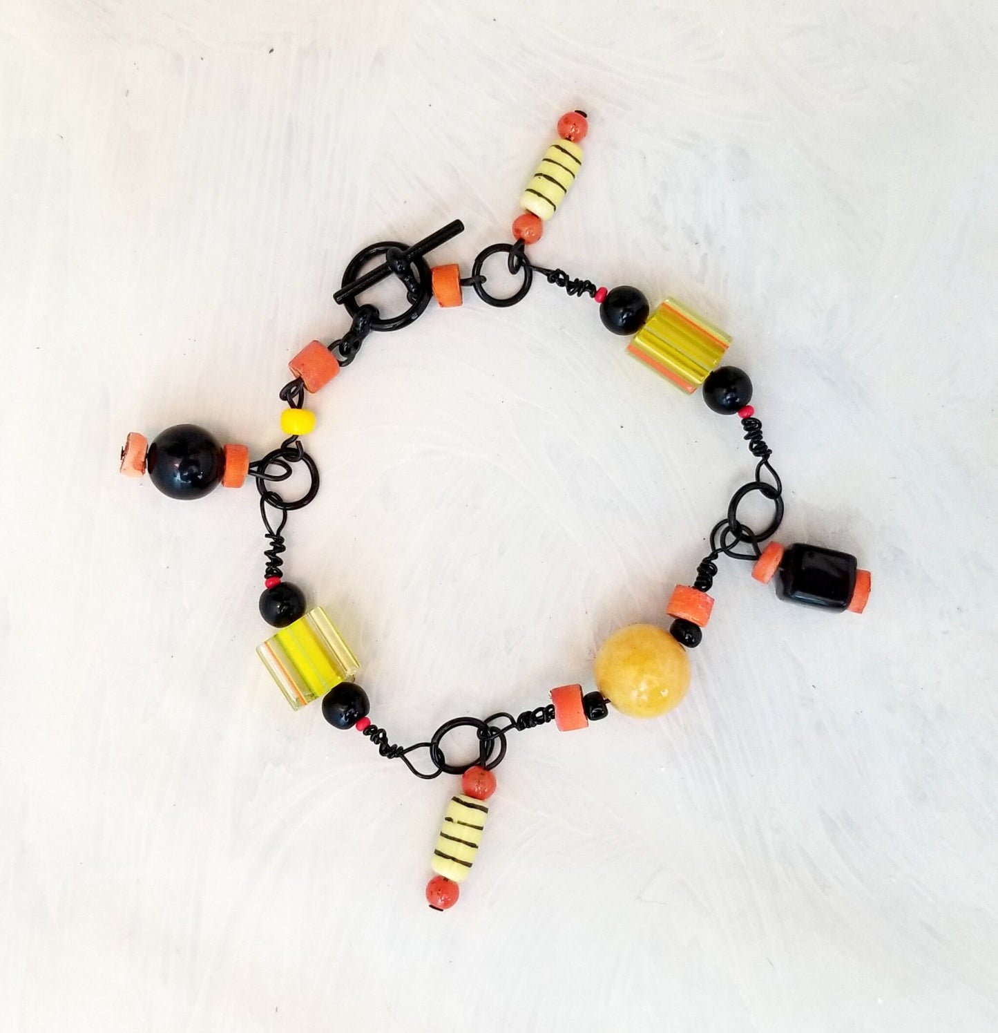 Modern Style Wire Wrapped Bracelet in Black, Yellow and Orange, Toggle, 7.5" (19 cm)