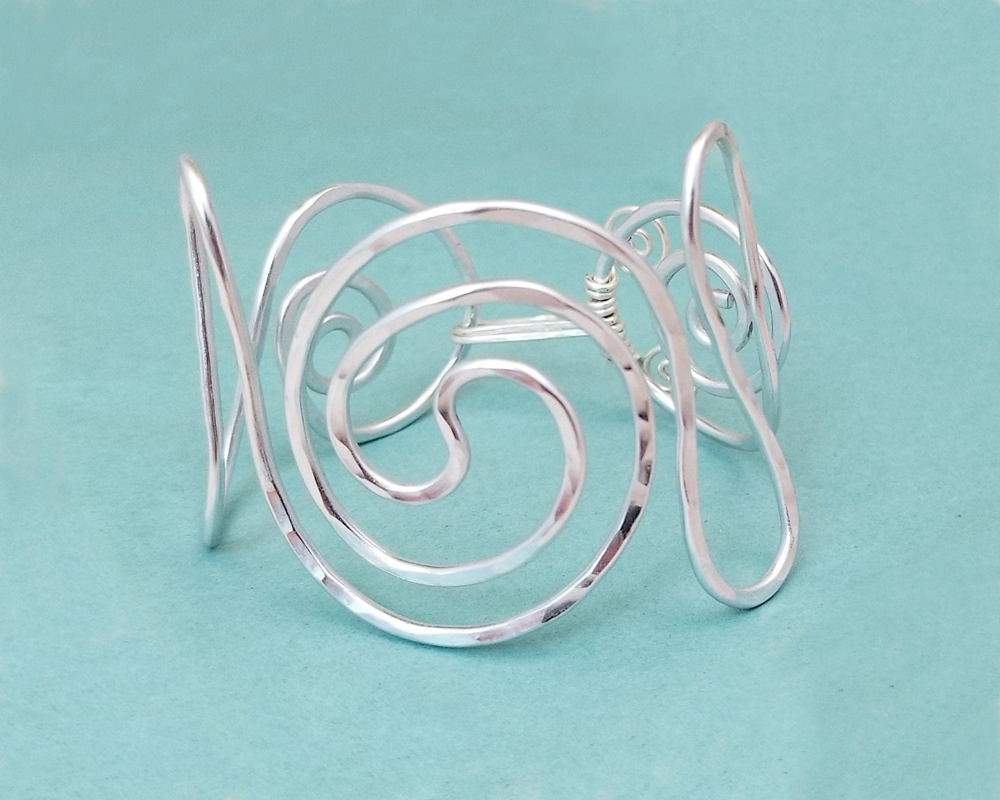 Minimalist Statement Cuff, Central Spiral Design, Hammered Wire, Adjustable, Lightweight, Choice of Colors and Metals